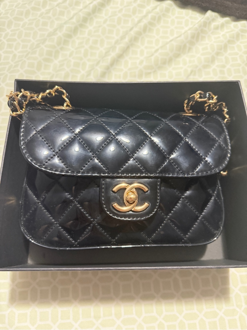 CHANEL Black Quilted Patent Leather Shoulder Bag with Gold Hardware
